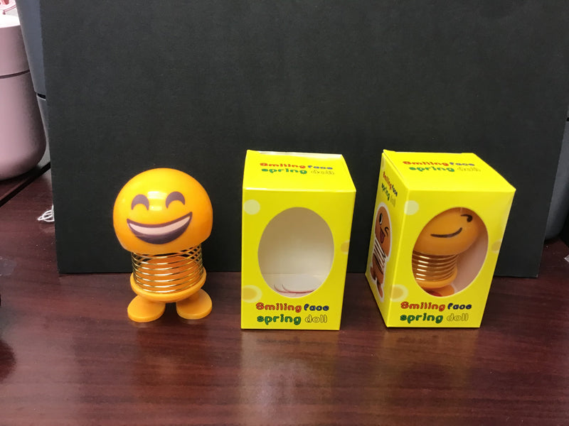 Smiling face spring doll price deals